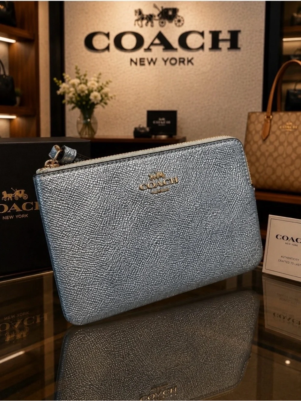 Coach Metallic Light Blue Leather Wristlet with Gold Logo